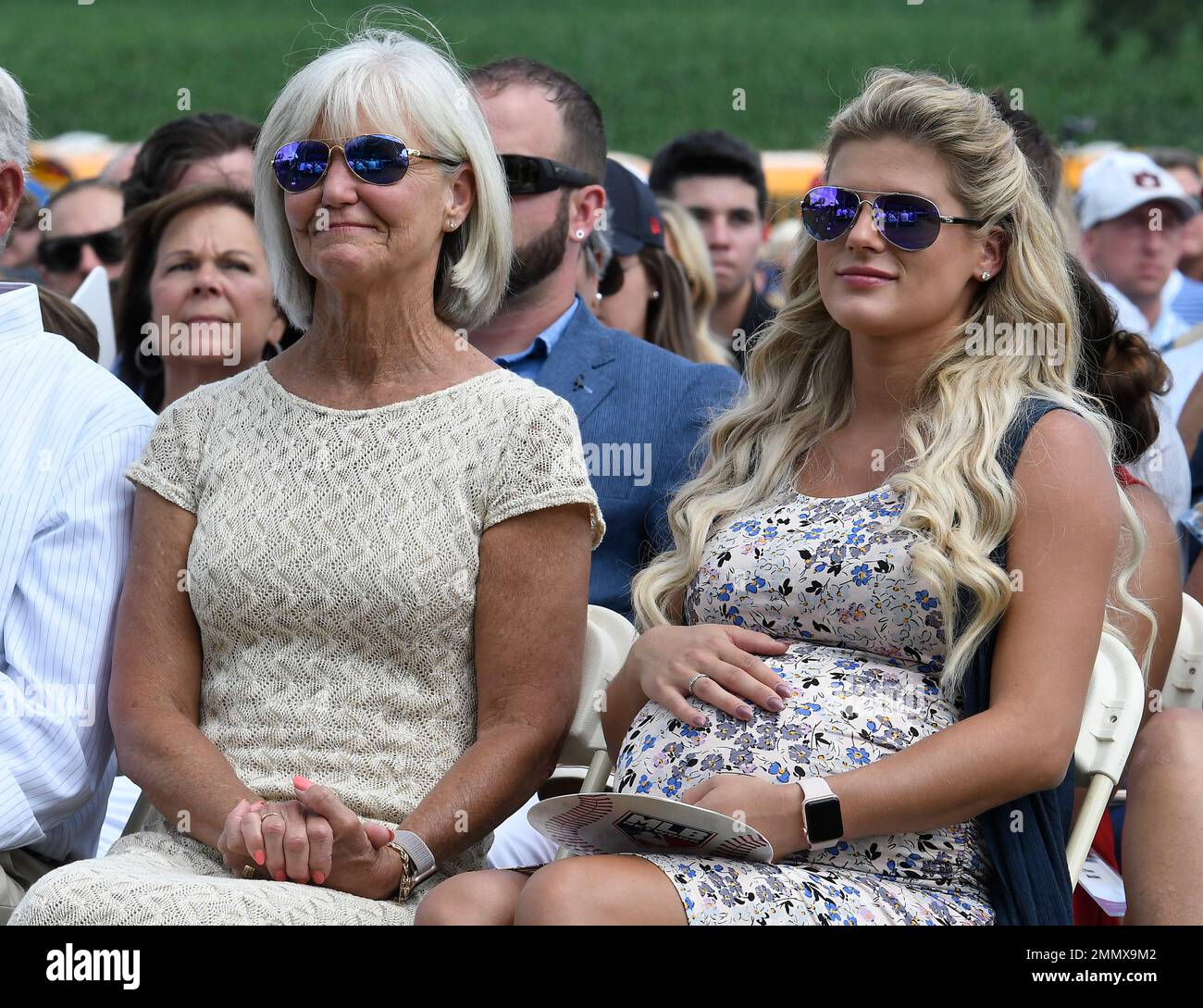 Chipper Jones' mother Lynne Jones ,left, and his wife Taylor Jones