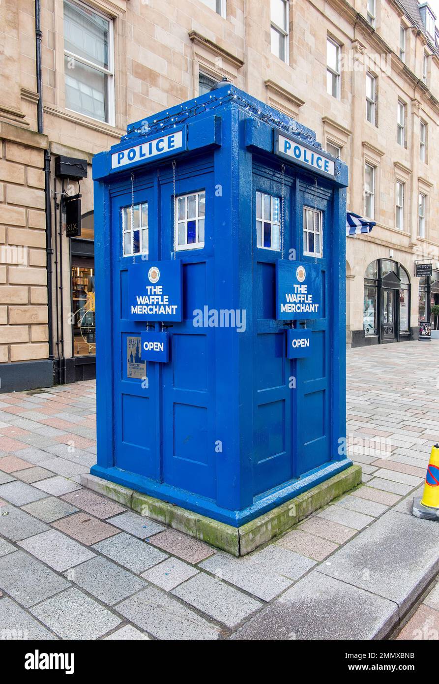 Traditional iconic Police Box repurposed as kiosk selling waffles in Merchant City, Glasgow, Scotland. Stock Photo
