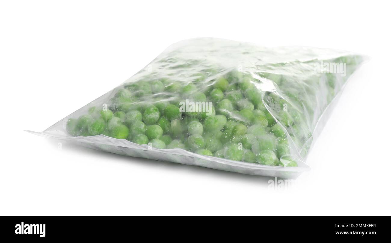 Frozen peas in plastic bag isolated on white. Vegetable preservation Stock Photo