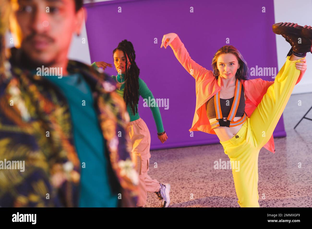 Image of group of group of diverse female and male hip hop dancers