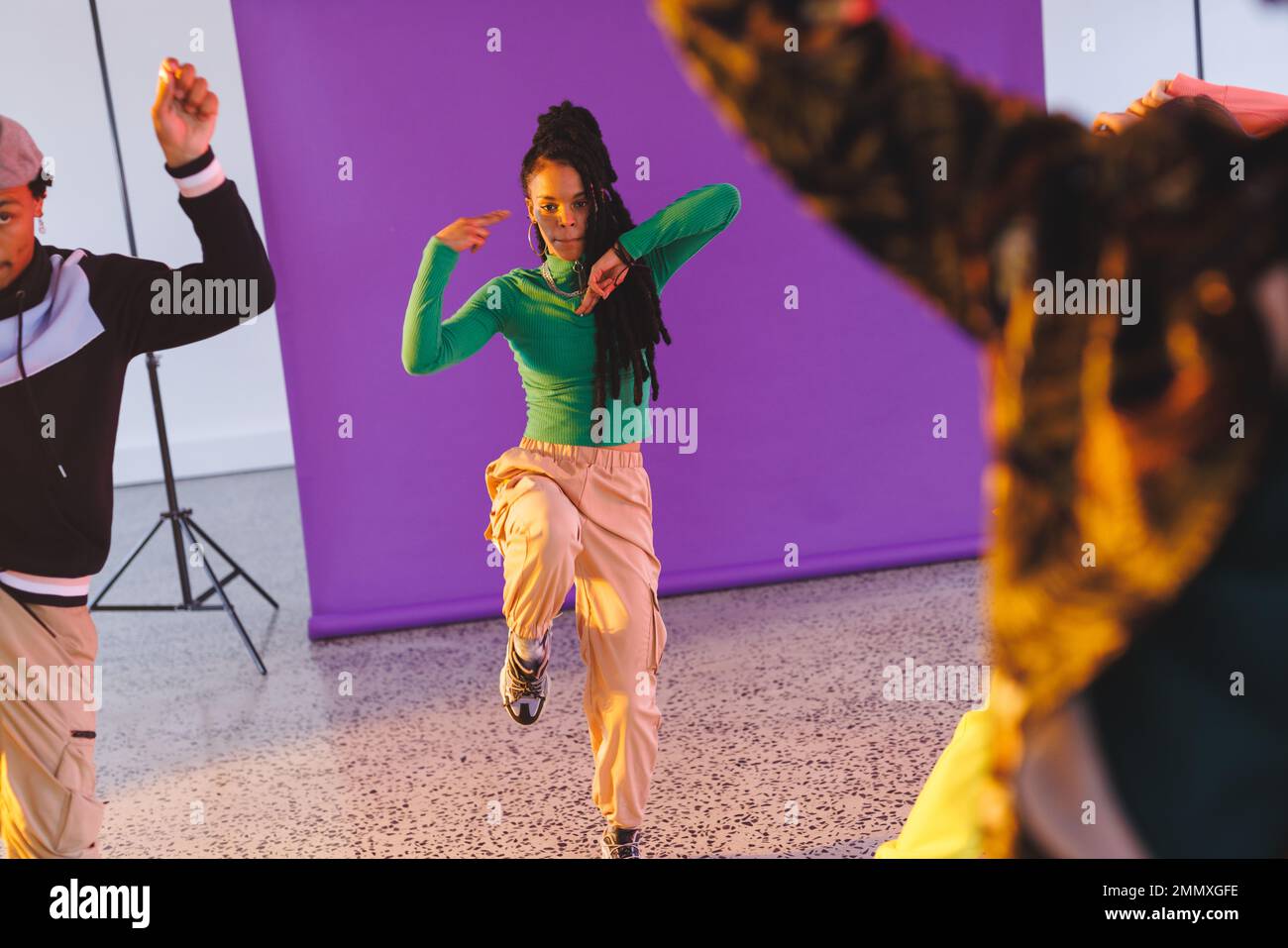 Image of group of group of diverse female and male hip hop dancers