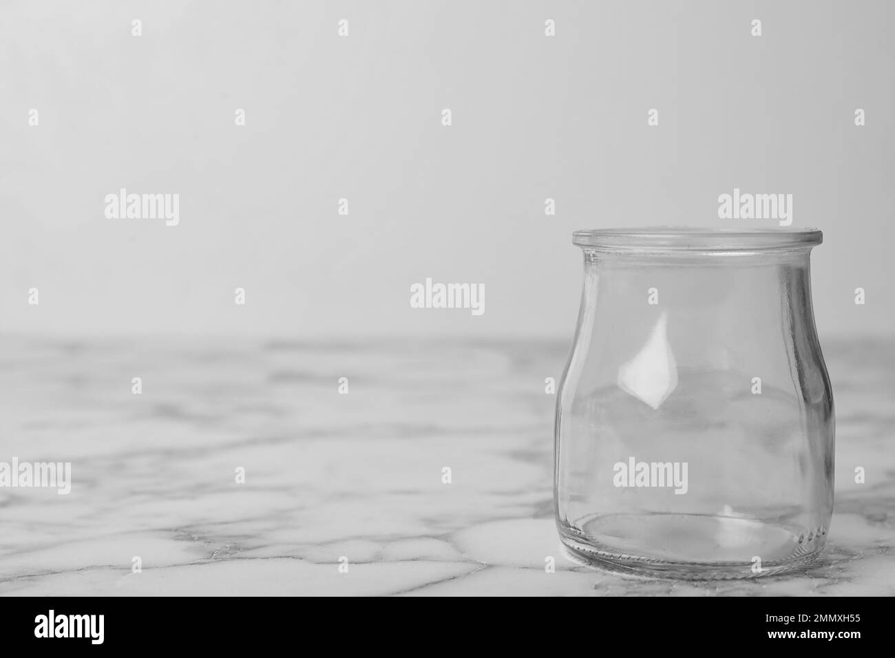 Empty glass jar on white marble table, space for text Stock Photo Alamy