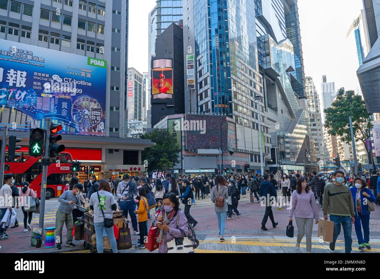Hong Kong December 2022 Busy street intersection and zebra crossing