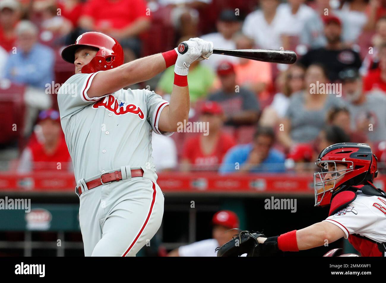 Philadelphia Phillies' Rhys Hoskins hits a solo home run off Cincinnati
