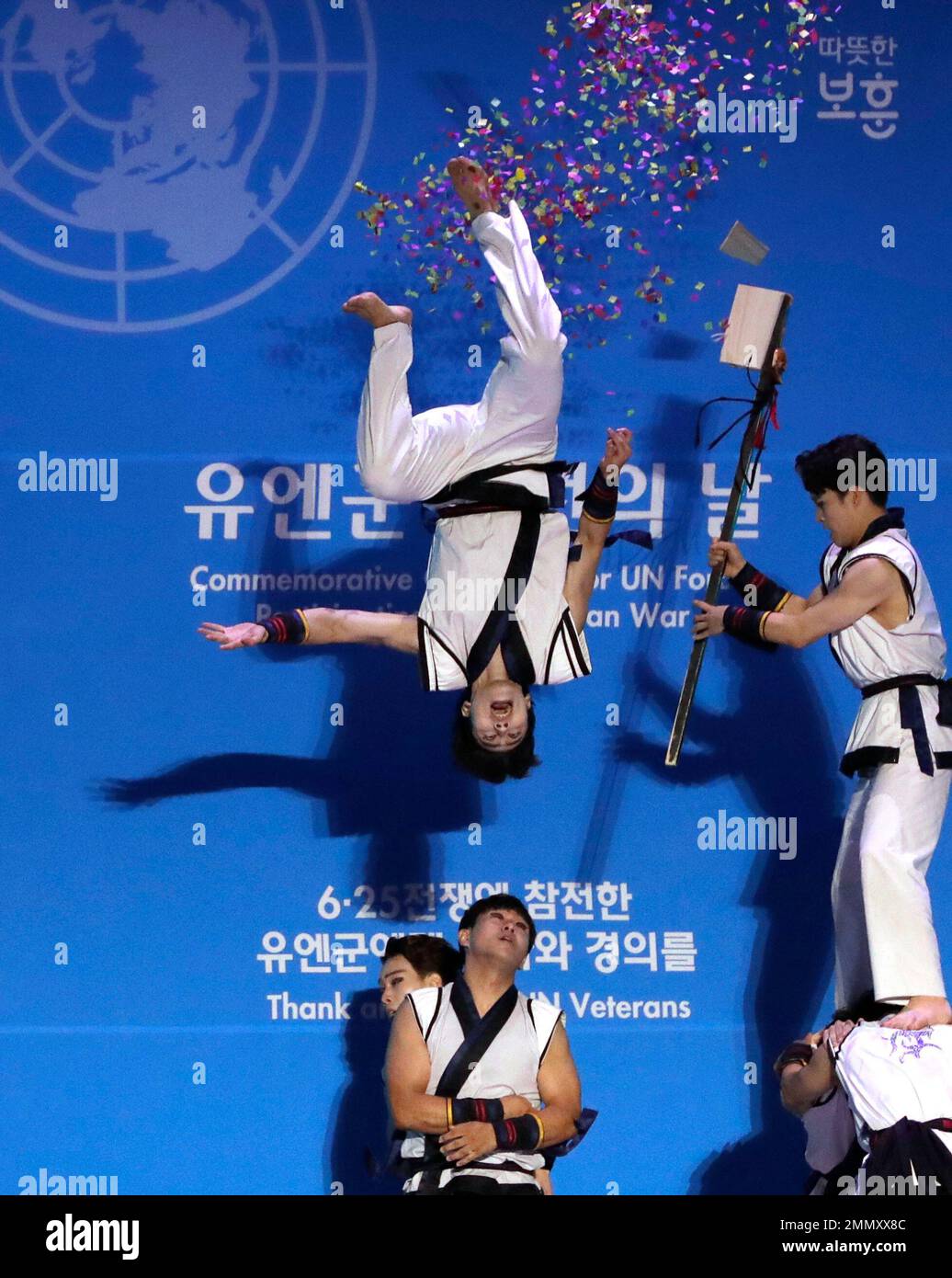 Participants perform a Korean martial art during a commemorating