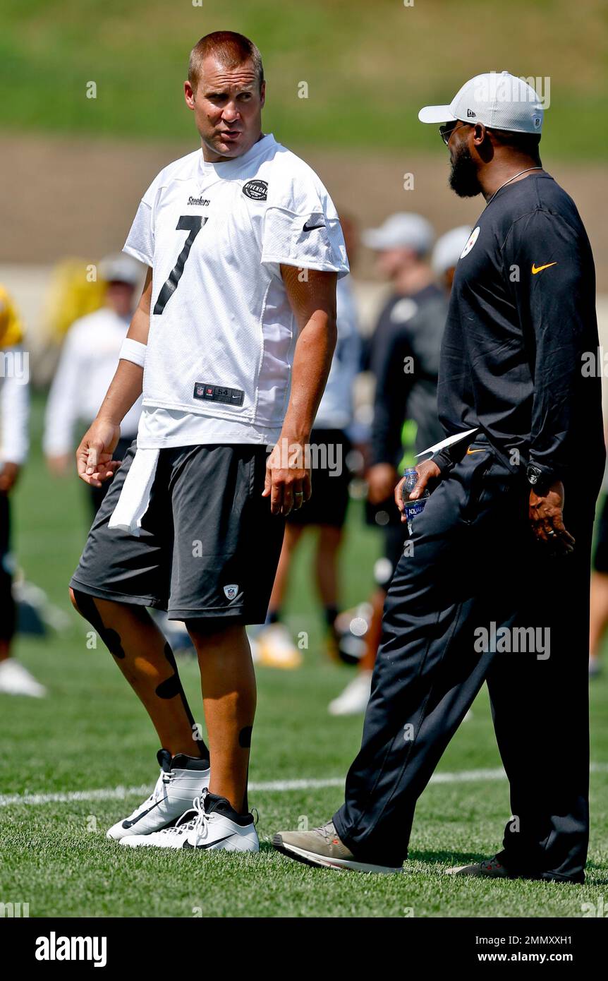 Pittsburgh Steelers quarterback Ben Roethlisberger, left, and head