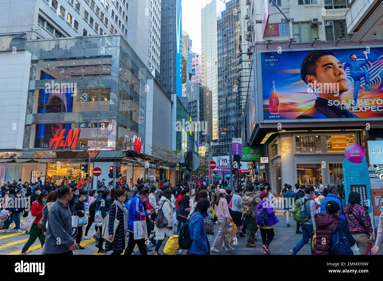 Hong Kong December 2022 Busy street intersection and zebra crossing