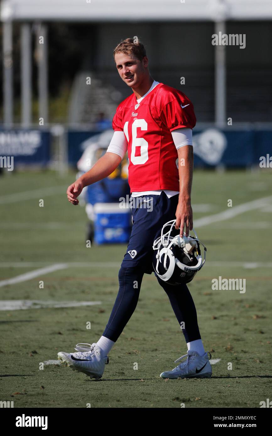 Los Angeles Rams quarterback Jared Goff walks across the field during ...
