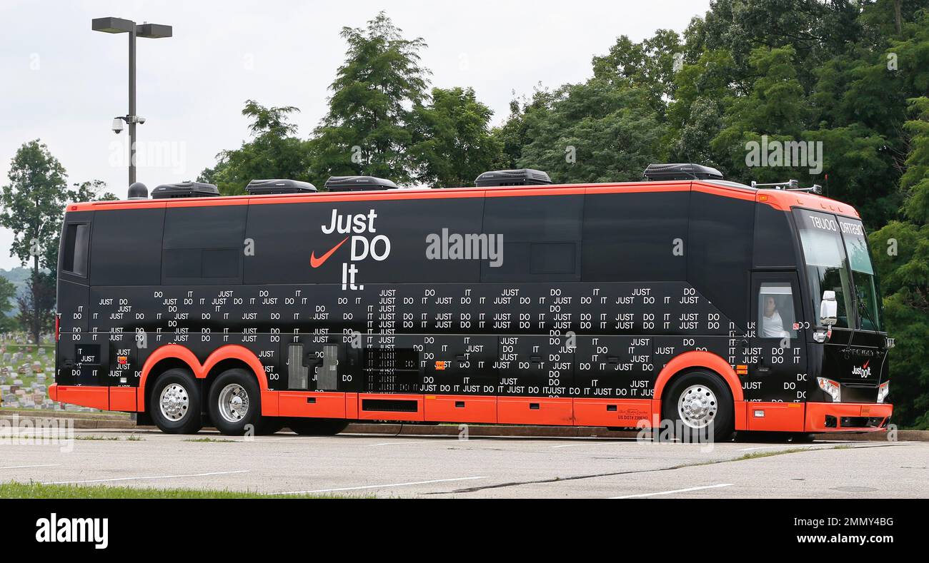 A bus with Nike logos and an image of Pittsburgh Steelers wide receiver  Antonio Brown (84) is parked in a lot at St. Vincent College as Brown  arrived for NFL football training