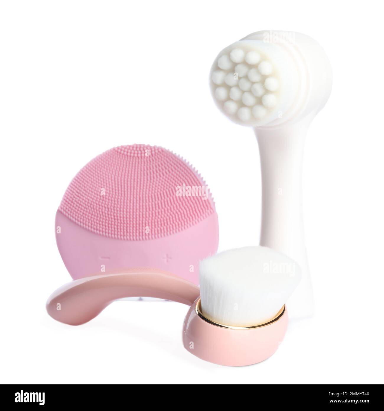 Face cleansing brushes isolated on white. Cosmetic tools Stock Photo