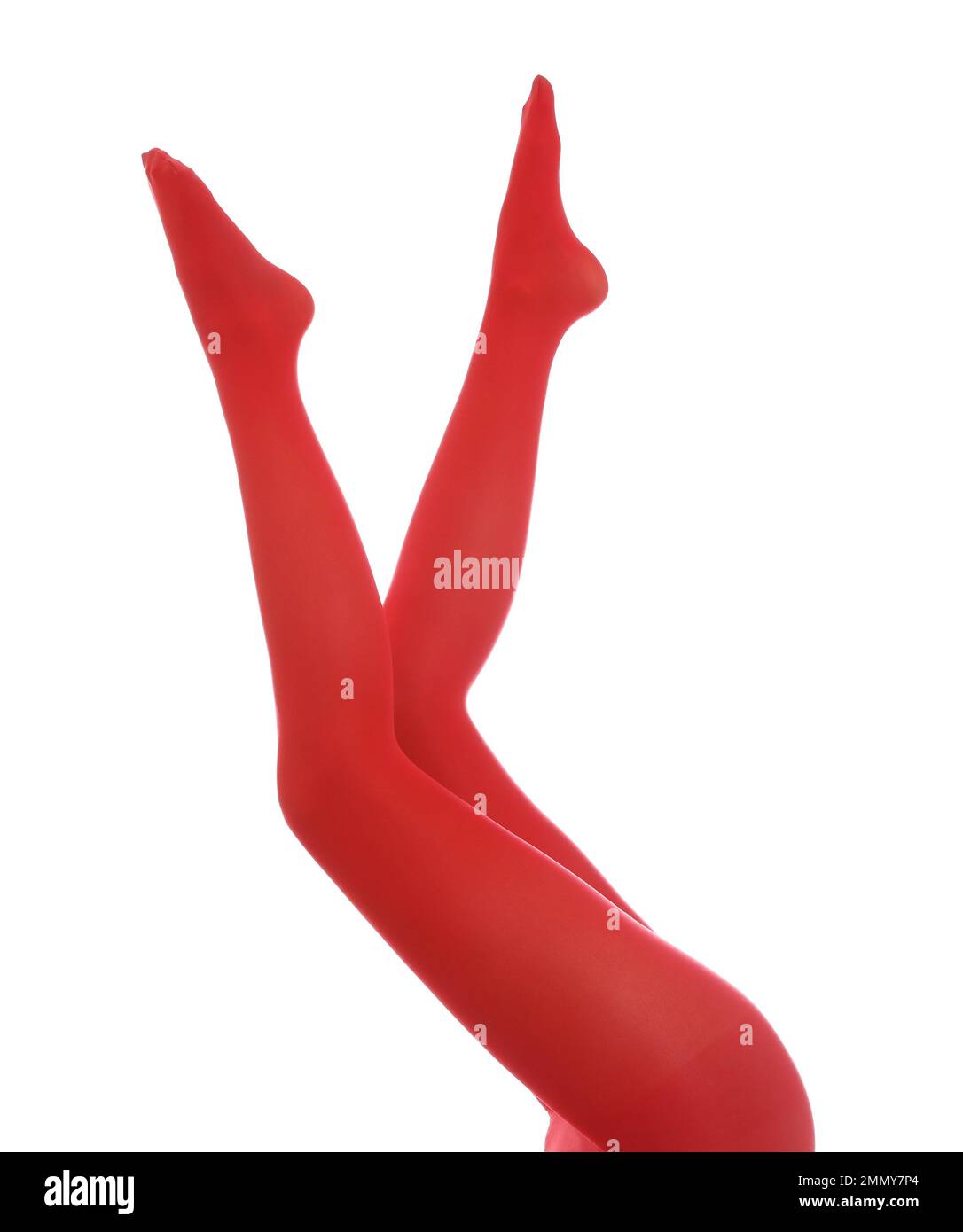 Woman wearing red tights on white background, closeup of legs Stock