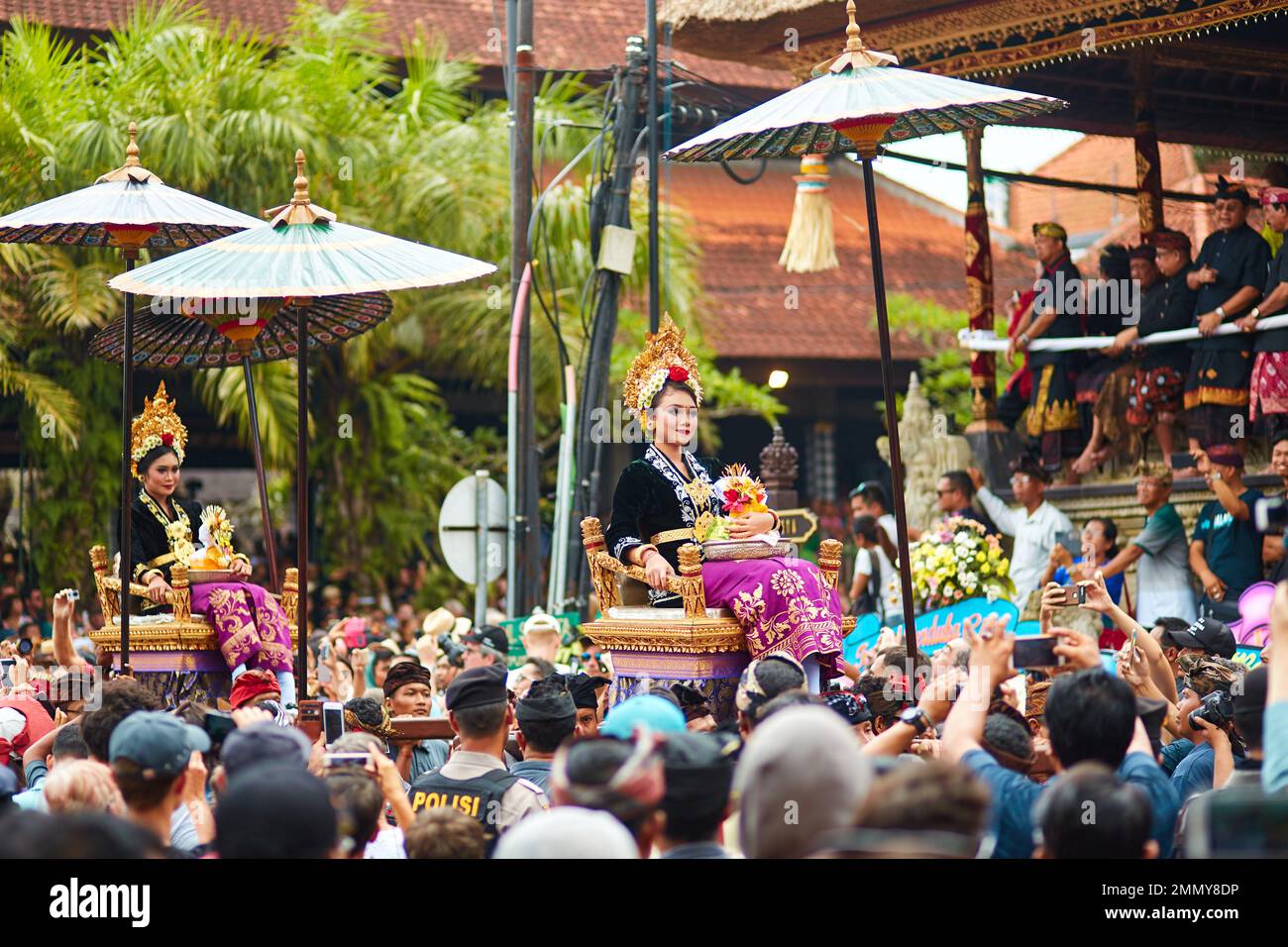 Rite of cremation of the royal family on the island of Bali. Topla people carry the throne with the members of the royal family. Bali, Indonesia - 03. Stock Photo