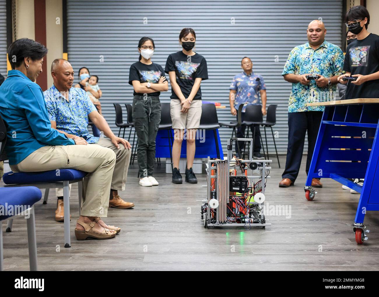 Guam Lt Gov Josh Tenorio Second From Right Test Drives A Robot guam-lt-gov-josh-tenorio-second-from-right-test-drives-a-robot