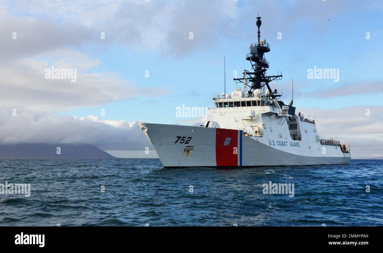 The crew of Coast Guard Cutter Stratton (WMSL 752) is near St. Lawrence Island, Alaska, Sept. 23, 2022, after visiting the community of Savoonga Sept. 22. While in Savoonga, members of the crew were given a tour of the community and taken to the town hall where the city mayor and Tribal chief discussed their concerns about soil erosion and the changing migratory patterns of marine mammals due to climate change. Villagers depend on migrating whales and walrus for subsistence. Stock Photo