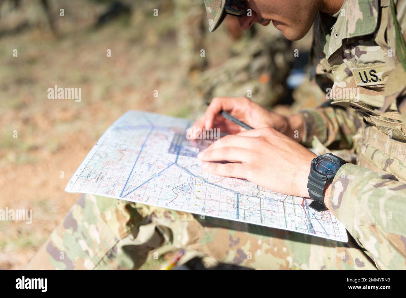 An Advanced Individual Training student uses a protractor to locate the