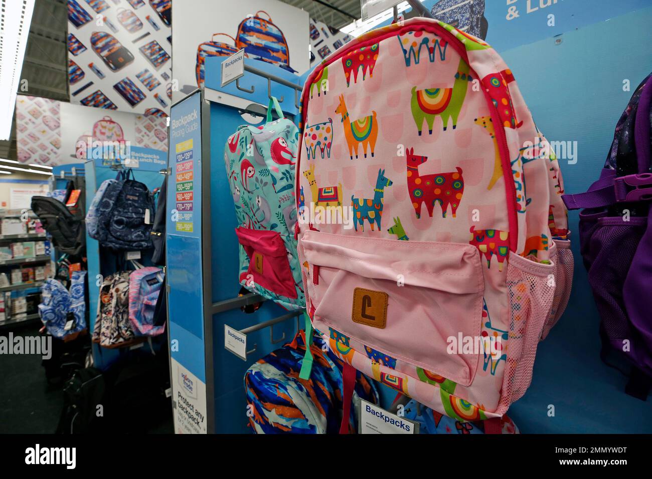 This is a display of back to school backpacks in a Staples store