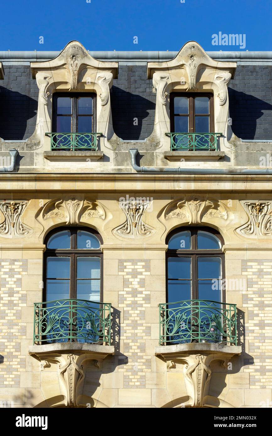 France, Meurthe et Moselle, Nancy, detail of the facade of the Victor Luc house, a mansion in Art Nouveau style built between 1901 and 1903 by architect Jacques Rene Hermant for Victor Luc who used to run a tannery and a leather tanning plant, ironwork made of wrought iron of the window railings by Louis Majorelle, frieze representing flowers under the cornice by ceramists Gentil and Bourdet located Rue de Malzeville Stock Photo