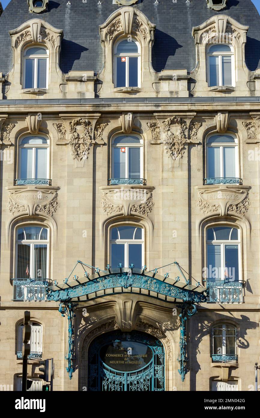 France, Meurthe et Moselle, Nancy, Art Nouveau facade of the head office of the Chambre de Commerce et d'Industrie de Meurthe et Moselle (Chamber of Commerce and Industry of Meurthe et Moselle) built between 1906 and 1908 by architects Louis Marchal and Emile Toussaint, ironwork made of wrought iron by Louis Majorelle, located Rue Raymond Poincare Stock Photo