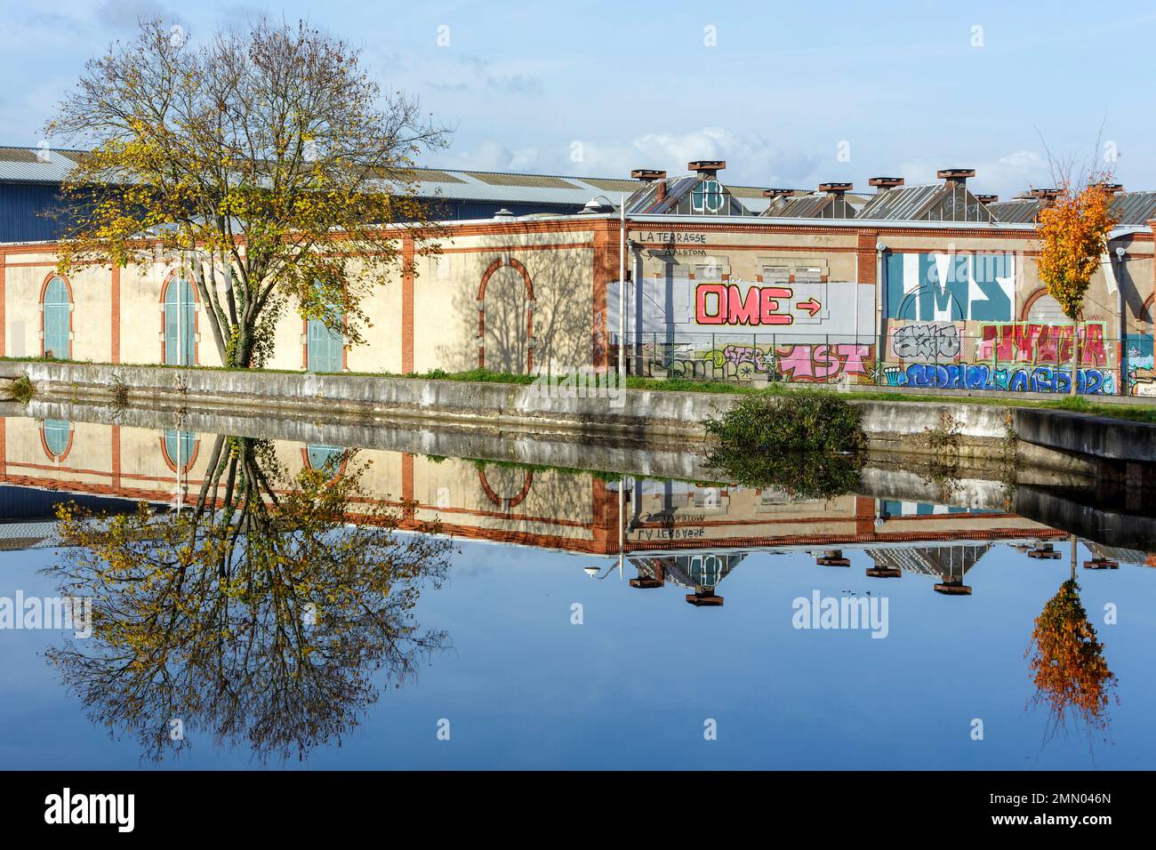 France, Meurthe et Moselle, Nancy, Meurthe riversides, the canal de Nancy (canal of Nancy) connects the canal from Marne to Rhine rivers, the former industrial Alstom plant Stock Photo