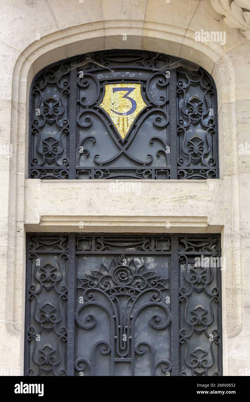 France, Meurthe et Moselle, Nancy, apartment building built in 1925 by architect Alfred Thomas Immeuble exemple of the transition between Art Nouveau and Art Deco style with ironwork made of wrought iron of the skylignt and the doorway by Thiesse workshop reminding the work of Edger Brandt and Raymond Subes in Paris located Avenue Anatole France Stock Photo