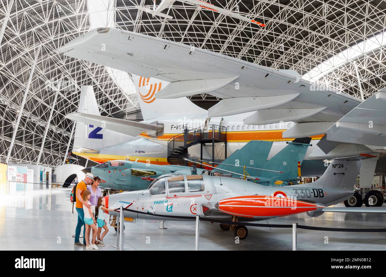 France, Haute Garonne, Blagnac, Aeroscopia, family of tourists visiting the Aeroscopia museum, dedicated to the history of civil aviation, in summer Stock Photo