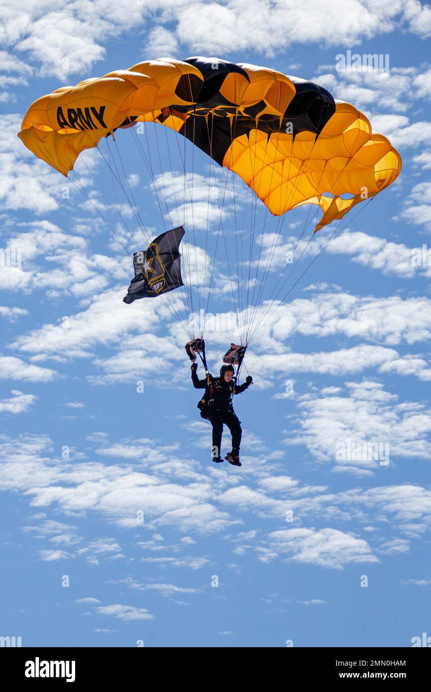 The U.S. Army Parachute Team, nicknamed the Golden Knights, prepares to land at the 2022 Marine Corps Air Station Miramar Air Show at MCAS Miramar, California, Sept. 24, 2022. Nicknamed the Golden Knights in 1962, “Golden” signifies the gold medals the team won in international competitions, and “Knights” alludes to the team’s ambition to conquer the skies. The Golden Knights perform in more than 100 events per year.  The theme for the 2022 MCAS Miramar Air Show, “Marines Fight, Evolve and Win,” reflects the Marine Corps’ ongoing modernization efforts to prepare for future conflicts. Stock Photo