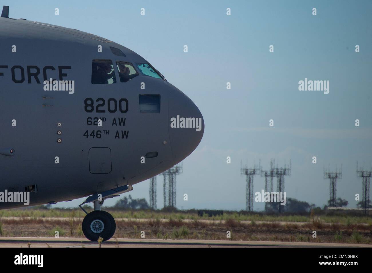 A U.S. Air Force C-17 Globemaster III with the C-17 West Coast Demo Team conducts an aerial demonstration during the 2022 Marine Corps Air Station Miramar Air Show at MCAS Miramar, San Diego, California, Sept. 24, 2022. The C-17 Demo Team, stationed at Joint Base Lewis-McChord, Washington, was established in 2019 and participates in air shows across the United States to showcase the capabilities of the C-17 and represent the Air Force through community outreach. The theme for the 2022 MCAS Miramar Air Show, “Marines Fight, Evolve and Win,” reflects the Marine Corps’ ongoing modernization effor Stock Photo