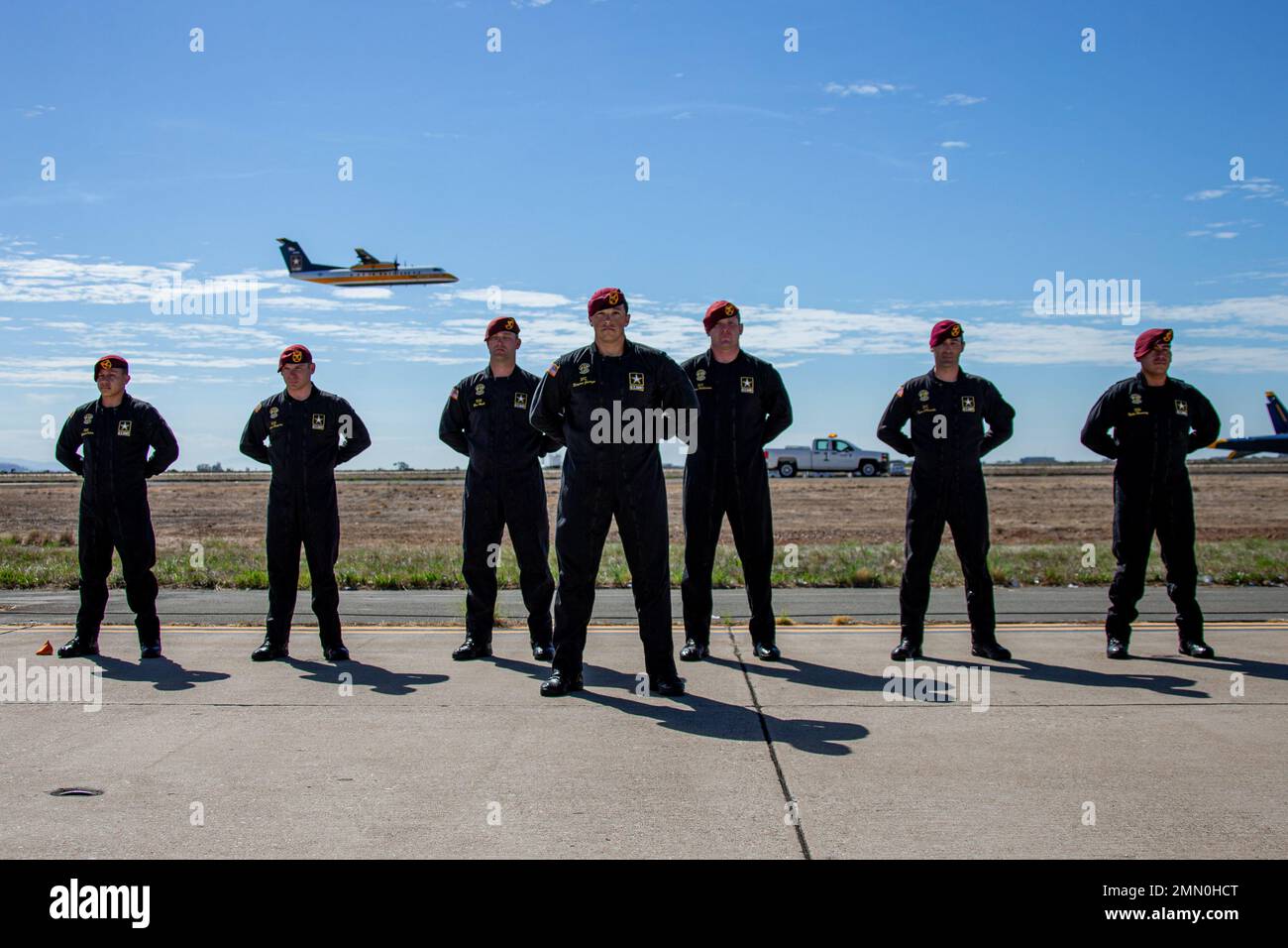 The U.S. Army Parachute Team, nicknamed the Golden Knights, stand at parade rest at the 2022 Marine Corps Air Station Miramar Air Show at MCAS Miramar, California, Sept. 24, 2022. Nicknamed the Golden Knights in 1962, “Golden” signifies the gold medals the team won in international competitions, and “Knights” alludes to the team’s ambition to conquer the skies. The Golden Knights perform in more than 100 events per year.  The theme for the 2022 MCAS Miramar Air Show, “Marines Fight, Evolve and Win,” reflects the Marine Corps’ ongoing modernization efforts to prepare for future conflicts. Stock Photo
