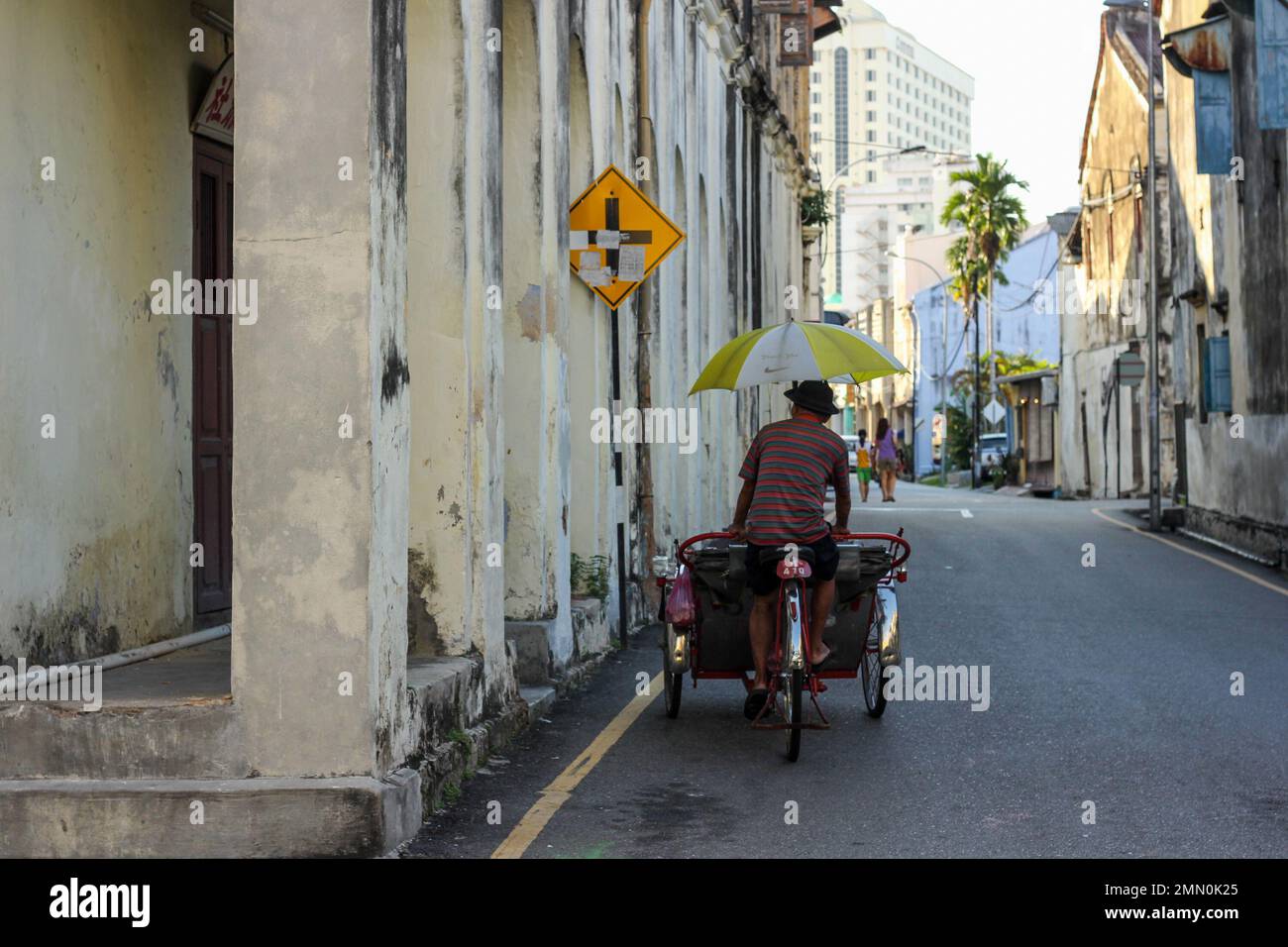 Georgetown, Penang, Malaysia - November 2012: A cycle rickshaw riding ...