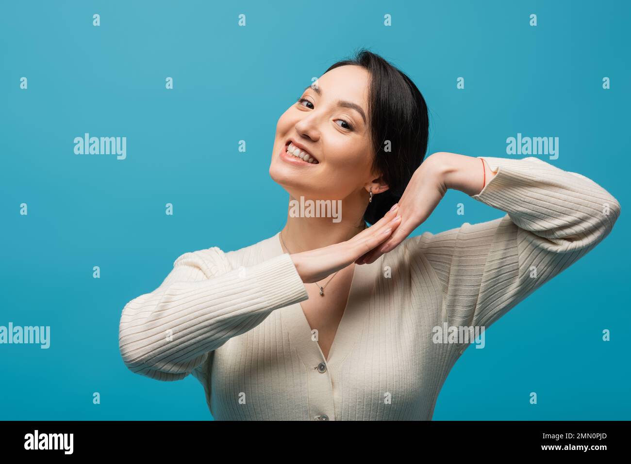 Asian woman posing camera hi-res stock photography and images - Alamy