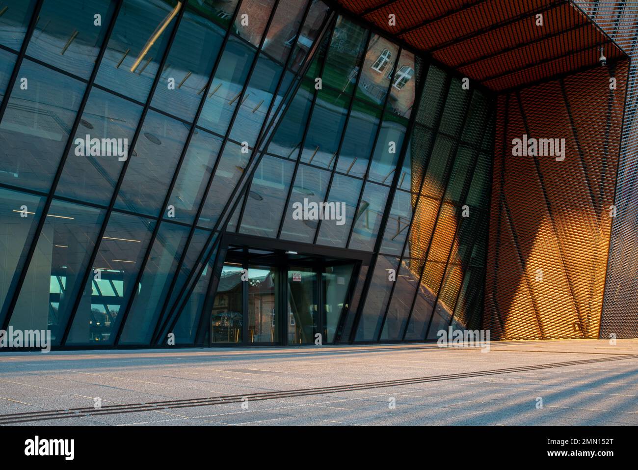 cgi backplate production.modern building illuminated with multicolored ...
