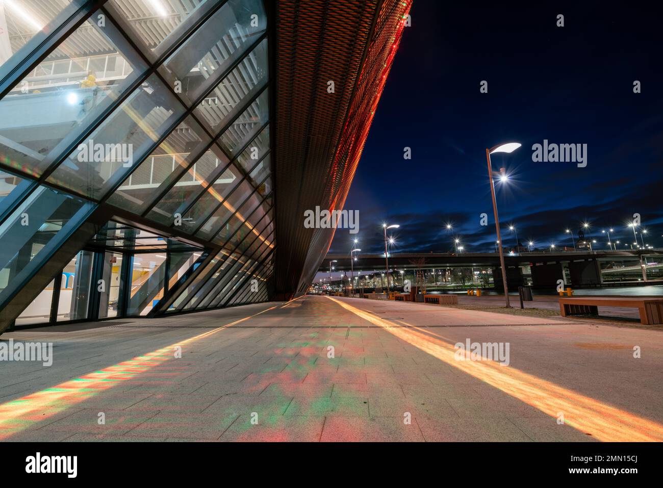 cgi backplate production.modern building illuminated with multicolored ...