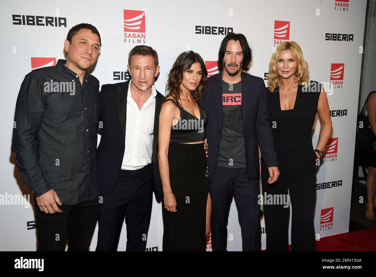 Director Matthew Ross, left, poses with cast members, from left, Pasha