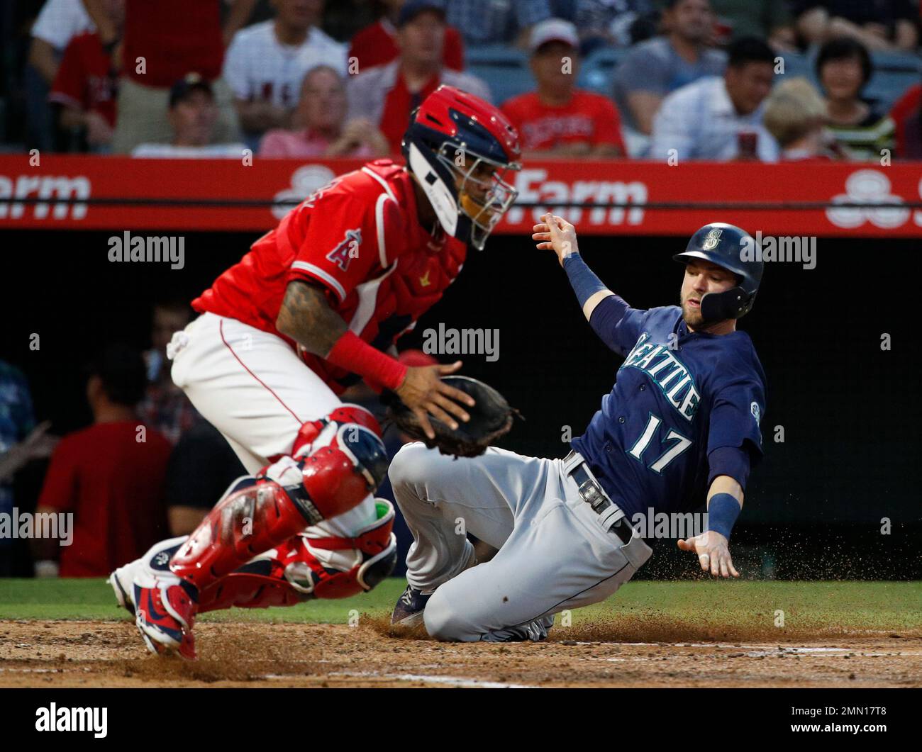 Seattle Mariners' Mitch Haniger waits for a pitch during an at-bat in a  baseball game, Sunday, June 20, 2021, in Seattle. The Mariners won 6-2 in  10 innings. (AP Photo/Stephen Brashear Stock