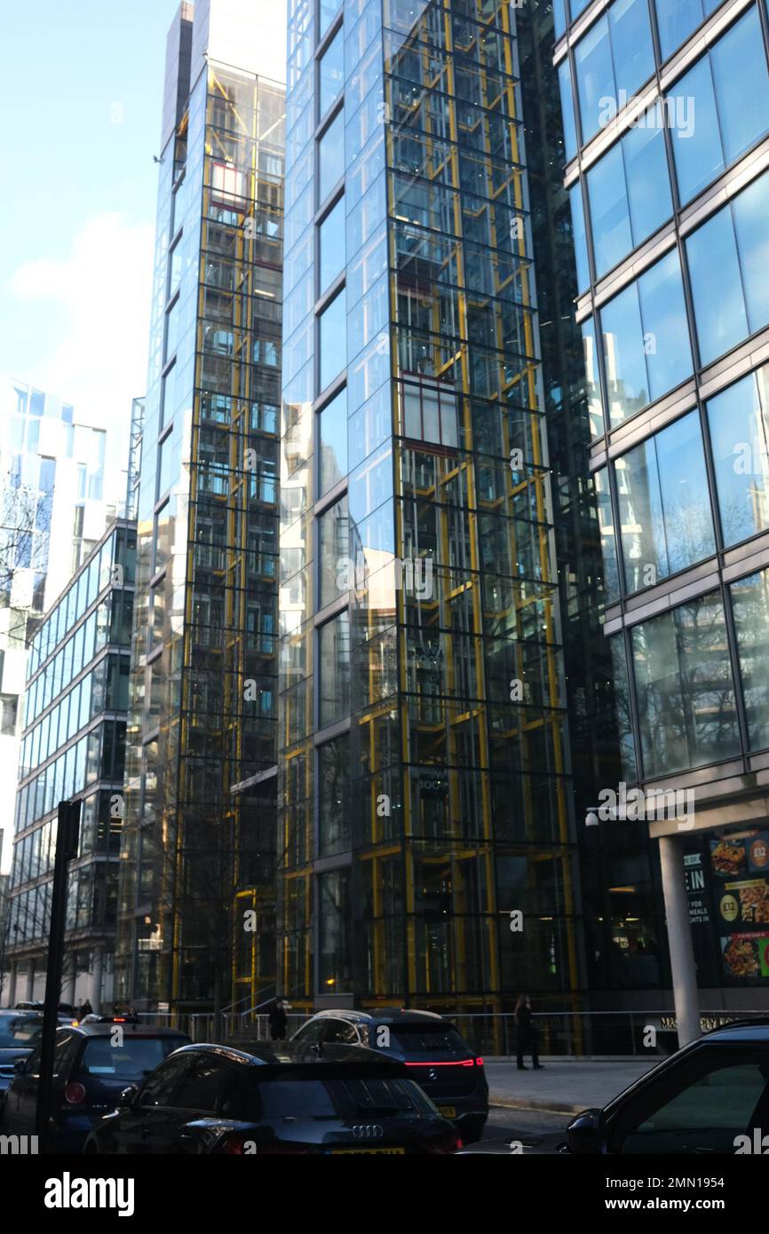 This image, taken from the Paddington Station taxi rank shows a cocktail of archtectural styes and sizes all thrown together in a small area. Stock Photo