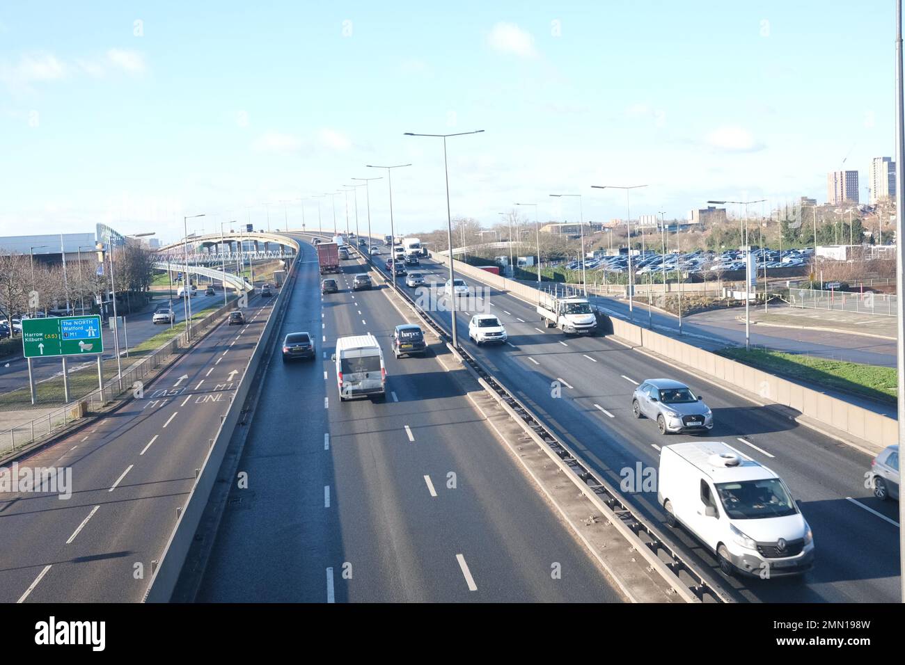 Traffic on the North Circular Rd viaduct near Brent Cross on a sunny day in January 2023 looking westward toward the Hangar Lane Gyratory System Stock Photo