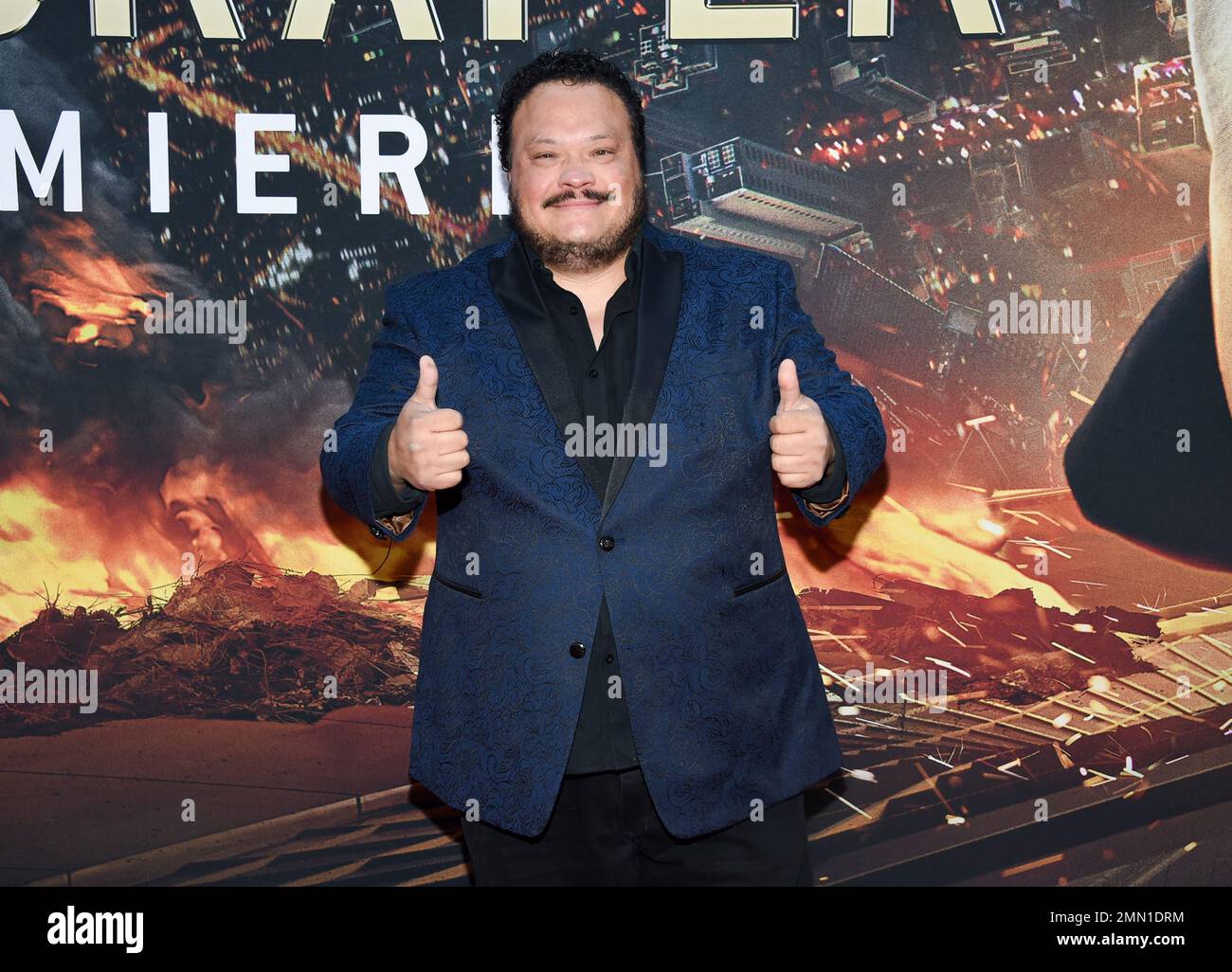 Actor Adrian Martinez attends the “Skyscraper” premiere at AMC Loews