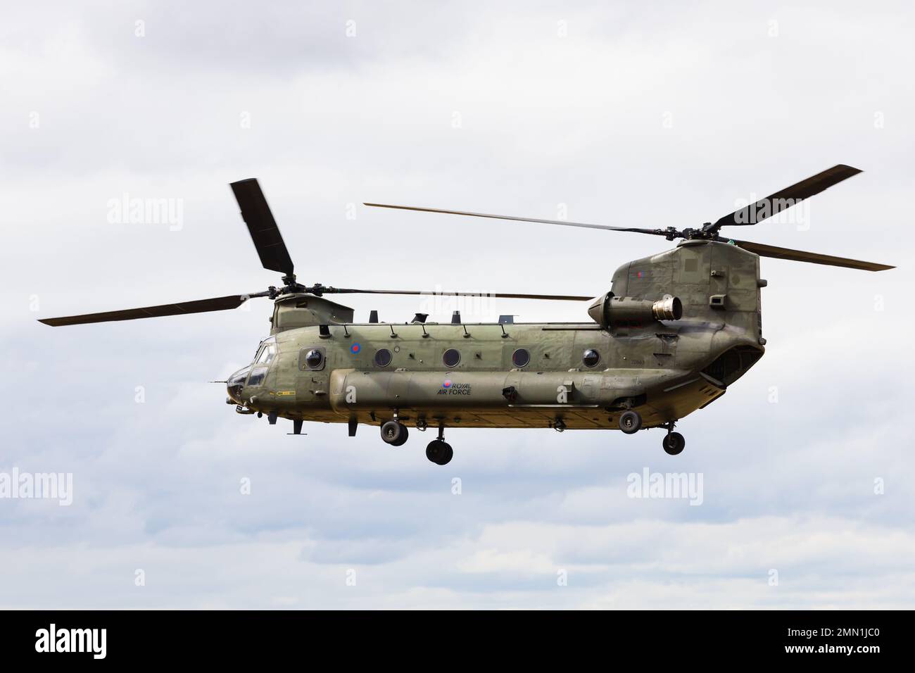 Boeing CH47D Chinook heavy helicopter of the RAF Chinook display team from RAF Odiham makes a low pass. Stock Photo