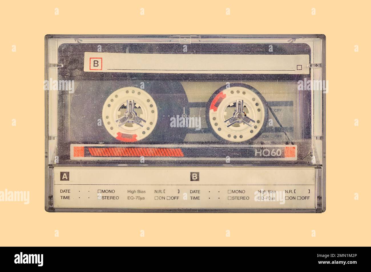 Retro styled image of a vintage audio compact cassette in a plastic