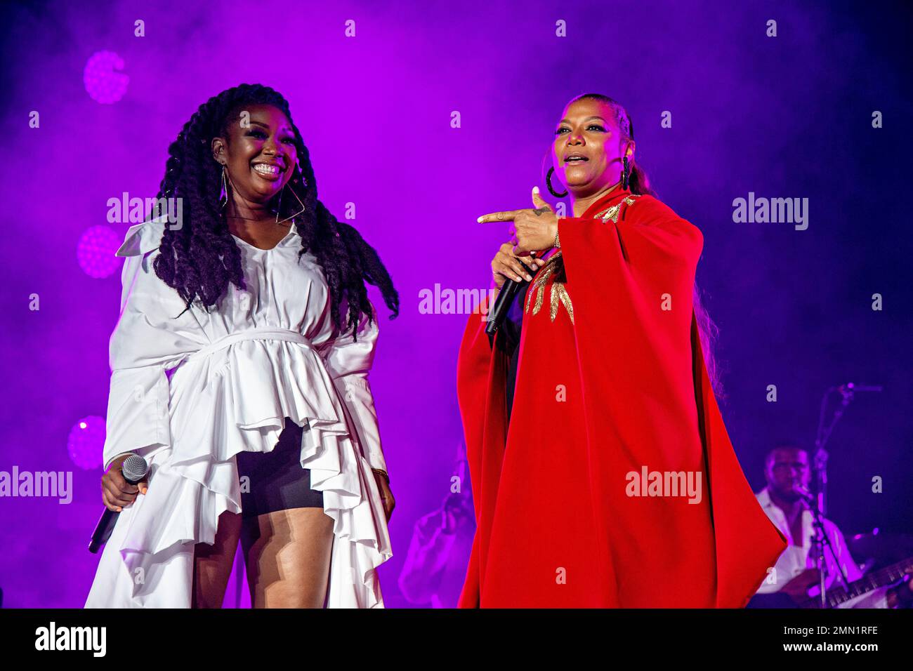 Brandy, left, and Queen Latifah perform at the 2018 Essence Festival at the MercedesBenz