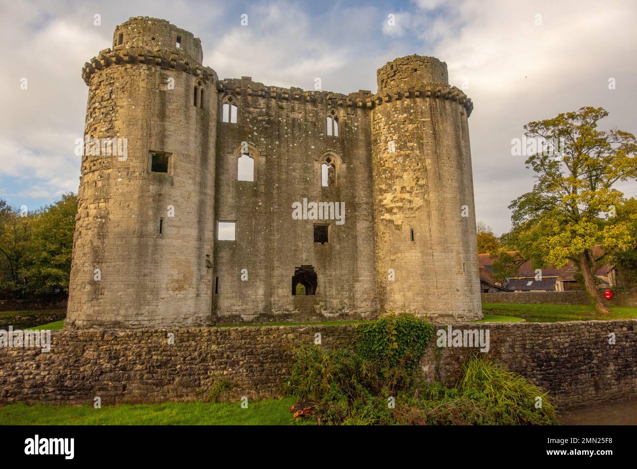 Looking up at the ruined towers of Nunney Castle Wiltshire. Stock Photo