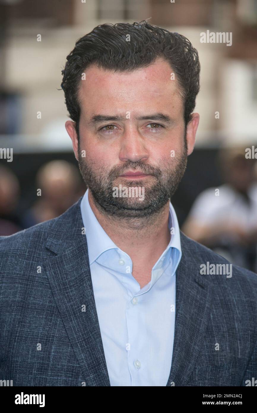 Actor Daniel Mays Poses For Photographers Upon Arrival At The UK 