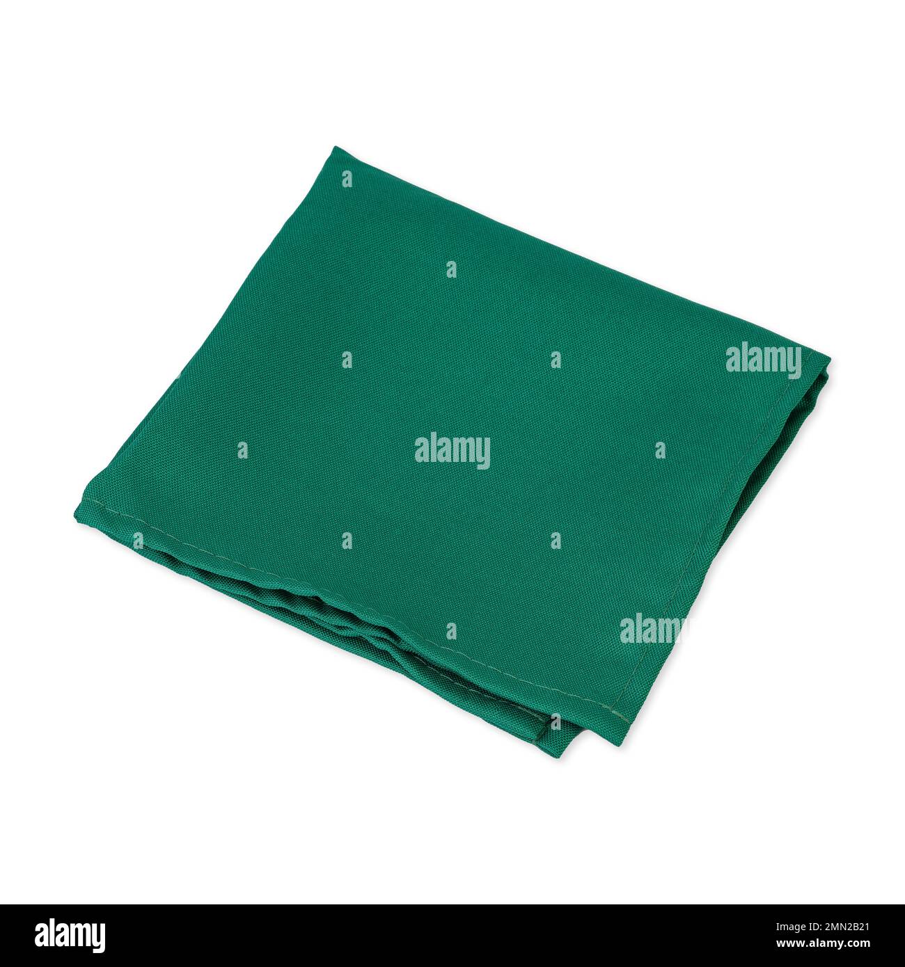 Folded green tissue napkin isolated over white background. Stock Photo