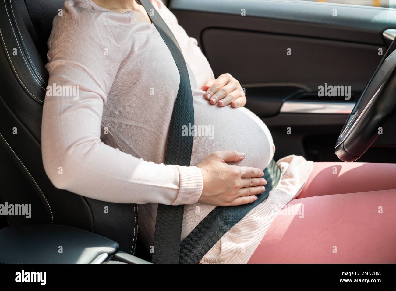 Happy pregnant women to drive Stock Photo Alamy