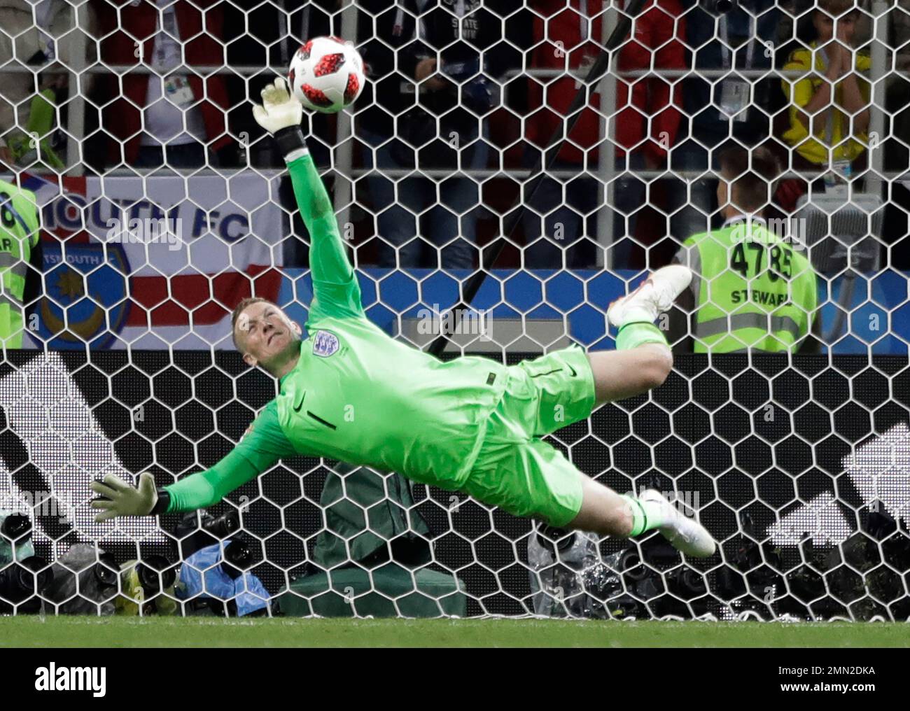 england-goalkeeper-jordan-pickford-saves-a-penalty-during-the-round-of