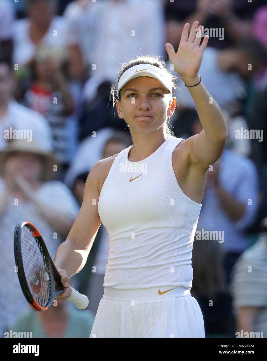 Romania's Simona Halep celebrates defeating Japan's Kurumi Nara in