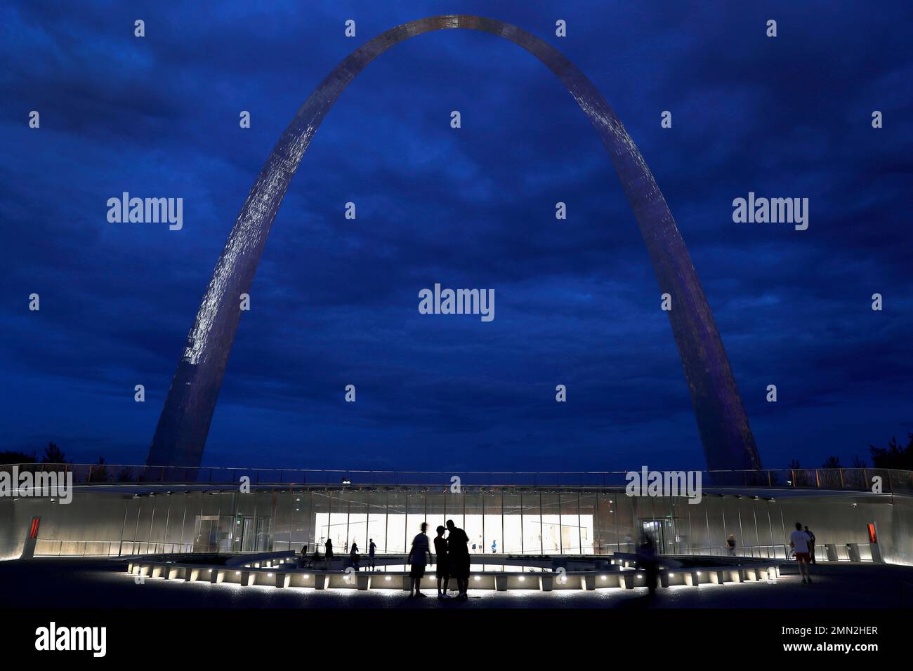 FILE - In this June 20, 2018, file photo, visitors stand outside a new ...