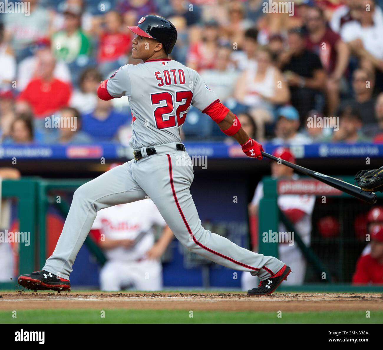 Washington Nationals' Juan Soto follows through on a tworun home run