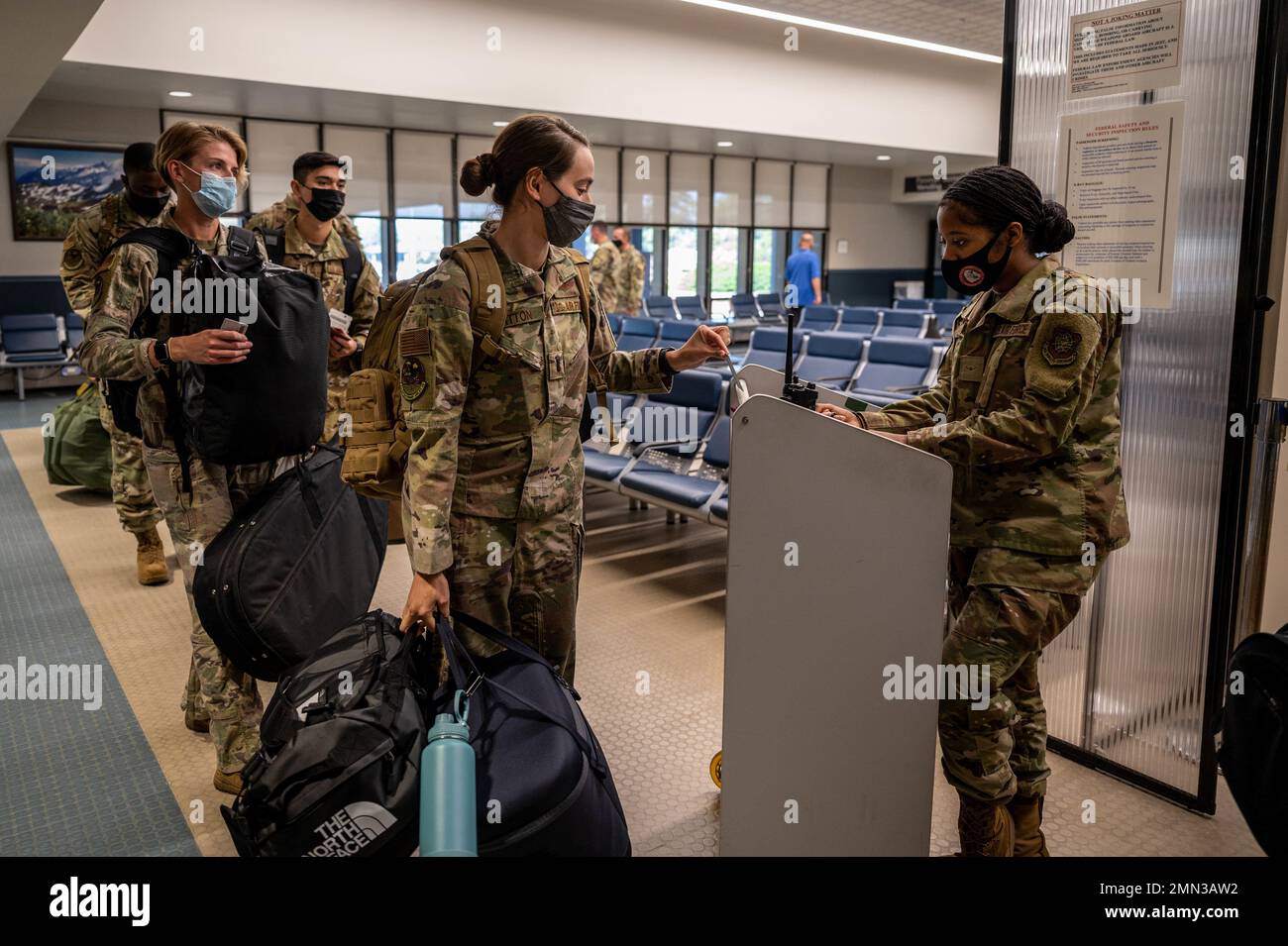 U.S. Air Force Airmen with the 62d Airlift Wing prepare for a