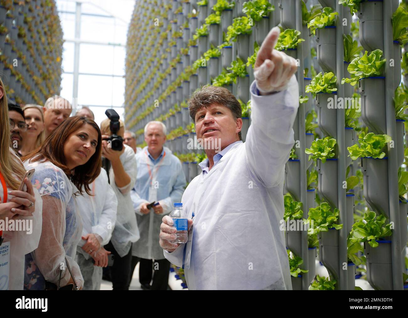 Eden Green Technology cofounder Jacques van Buuren leads a tour of the